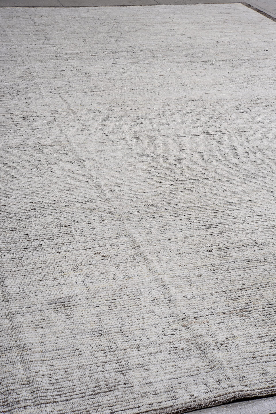 13' x 16' one-of-a-kind handmade vintage Tulu oversize rug. Color palette: ivory, charcoal, taupe, brown, gray, black, beige