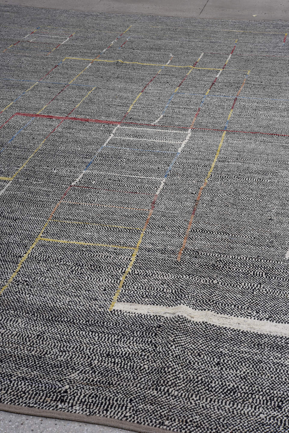 11' x 14' one-of-a-kind handmade vintage Tulu oversize rug. Color palette: charcoal, ivory, saffron, crimson, blue, taupe