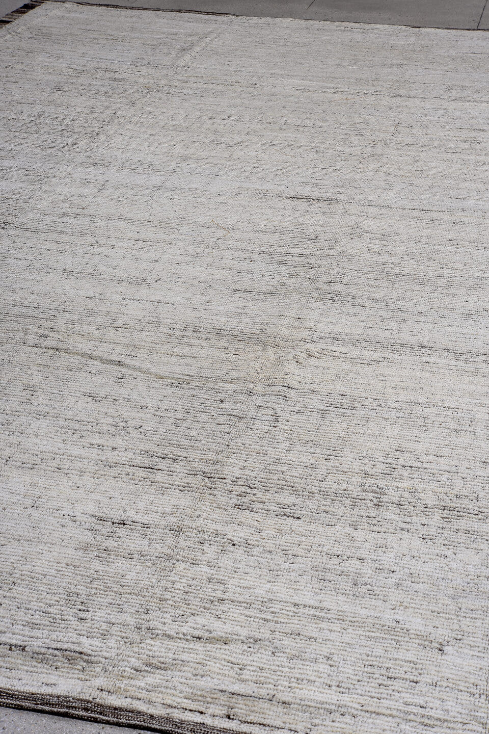 13' x 16' one-of-a-kind handmade vintage Tulu oversize rug. Color palette: ivory, charcoal, taupe, brown, gray, black, beige