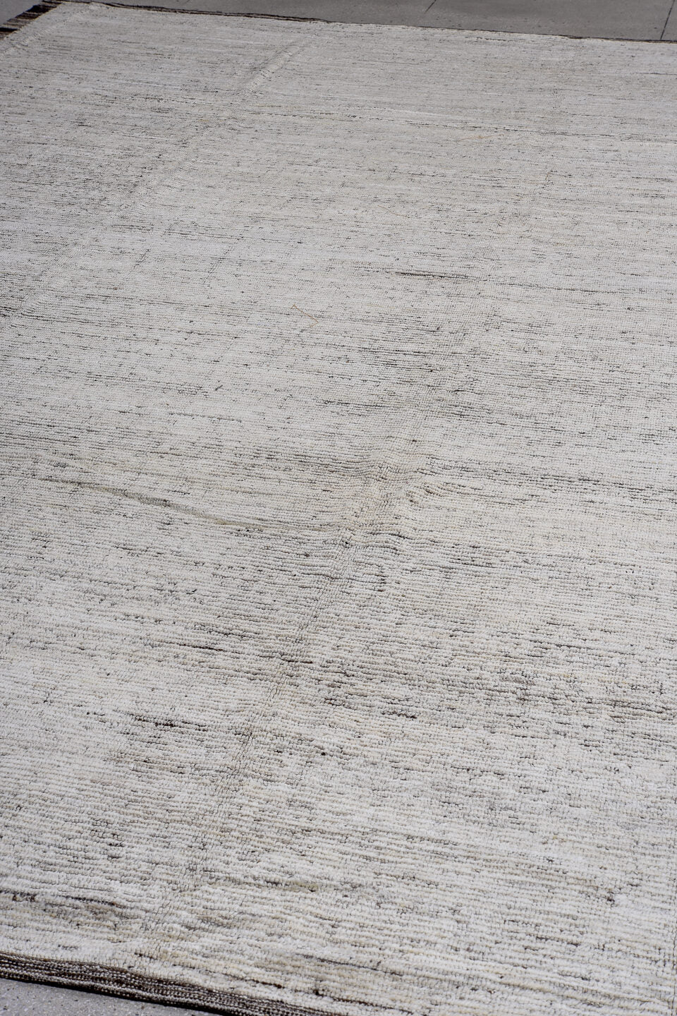 13' x 16' one-of-a-kind handmade vintage Tulu oversize rug. Color palette: ivory, charcoal, taupe, brown, gray, black, beige
