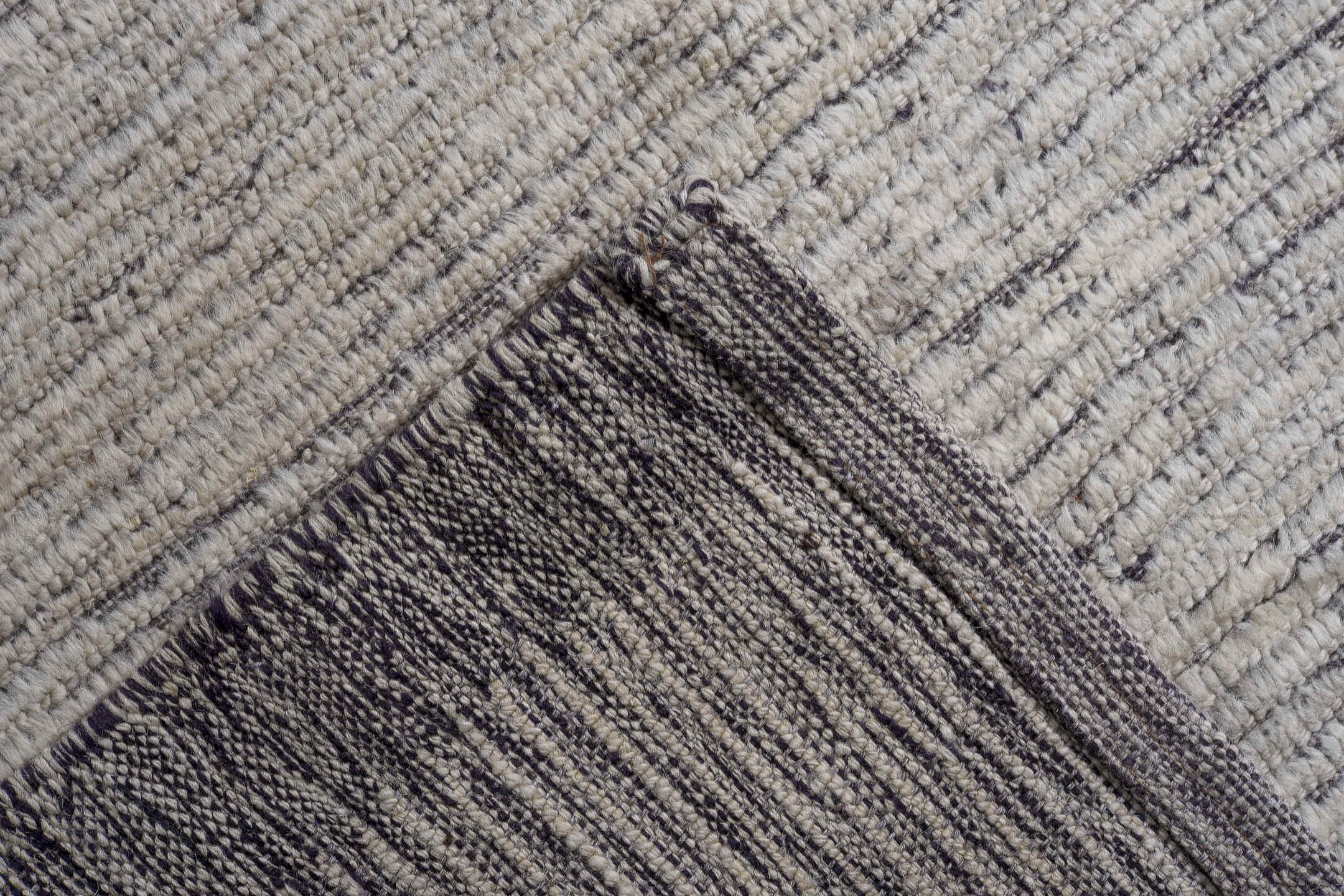 13' x 16' one-of-a-kind handmade vintage Tulu oversize rug. Color palette: ivory, taupe, gray, charcoal, beige, black