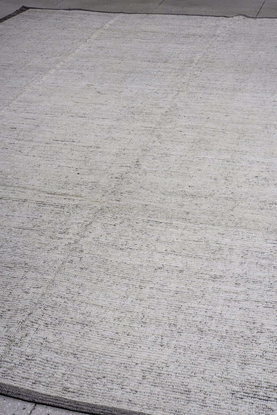 12' x 15' one-of-a-kind handmade vintage Tulu oversize rug. Color palette: ivory, charcoal, taupe, gray, black, beige