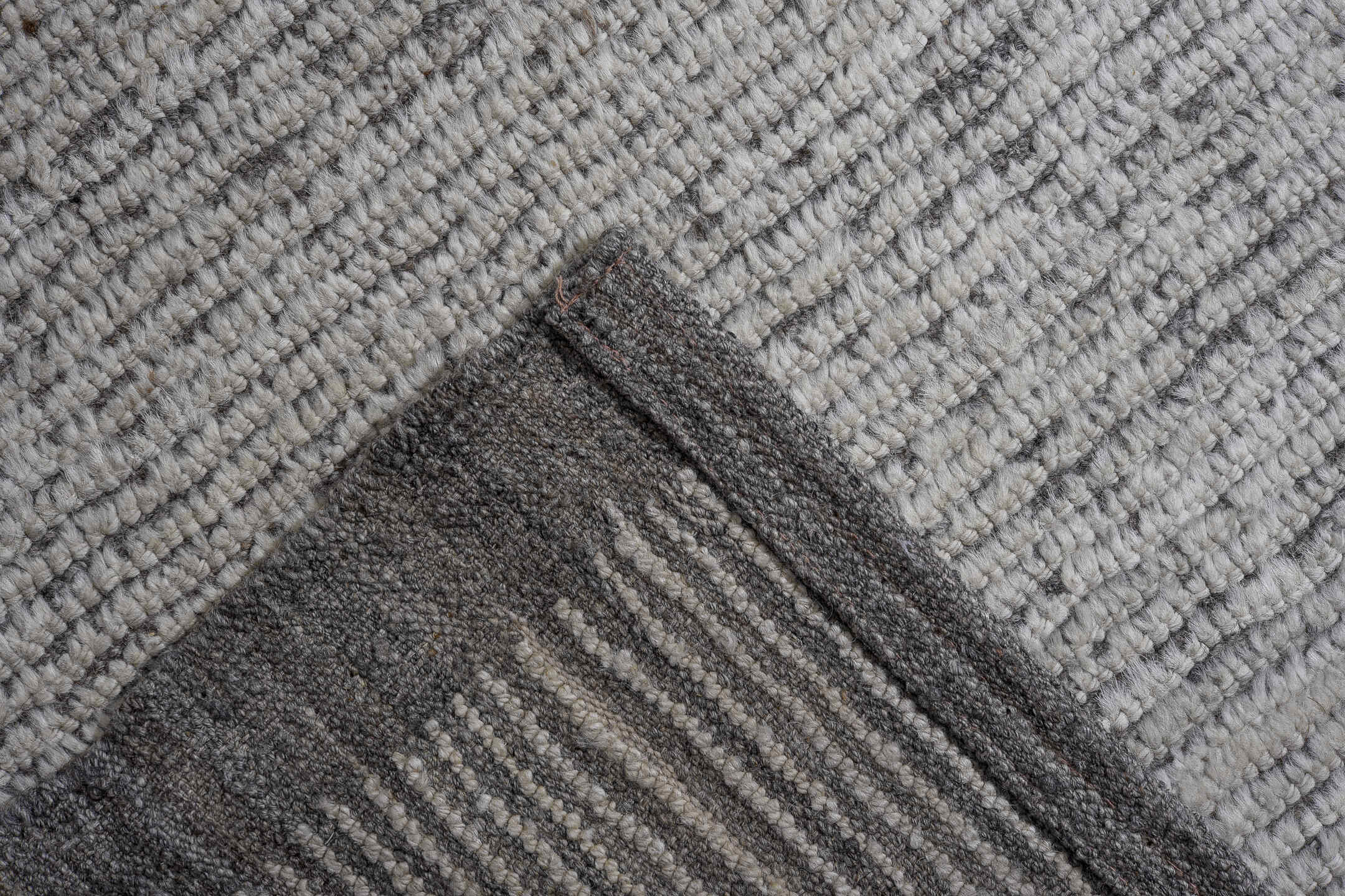 12' x 15' one-of-a-kind handmade vintage Tulu oversize rug. Color palette: ivory, charcoal, taupe, gray, black, beige