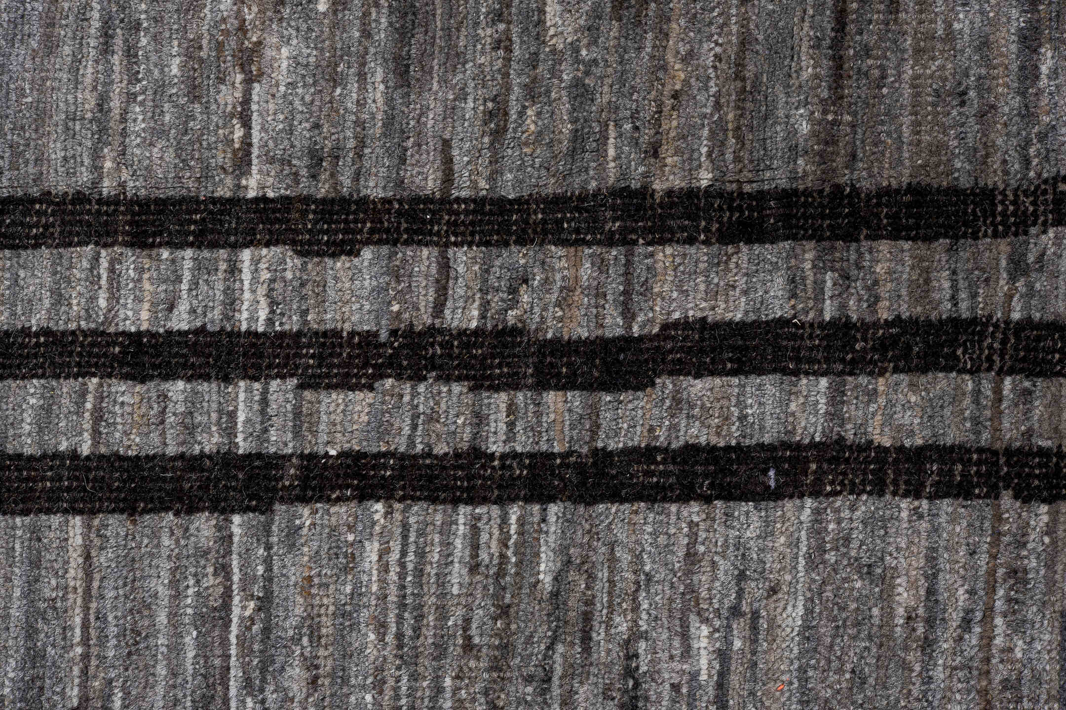 12' x 14' one-of-a-kind handmade vintage Tulu oversize rug. Color palette: black, brown, gray, pink, red