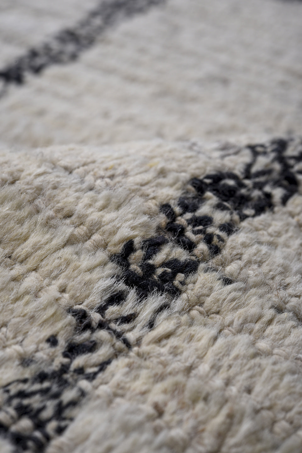 13' x 17' one-of-a-kind handmade vintage Tulu oversize rug. Color palette: ivory, charcoal, gray, black