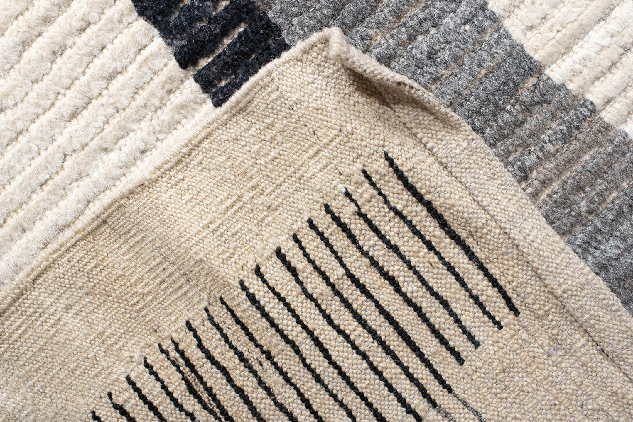 13' x 17' one-of-a-kind handmade vintage Tulu oversize rug. Color palette: ivory, charcoal, gray, black