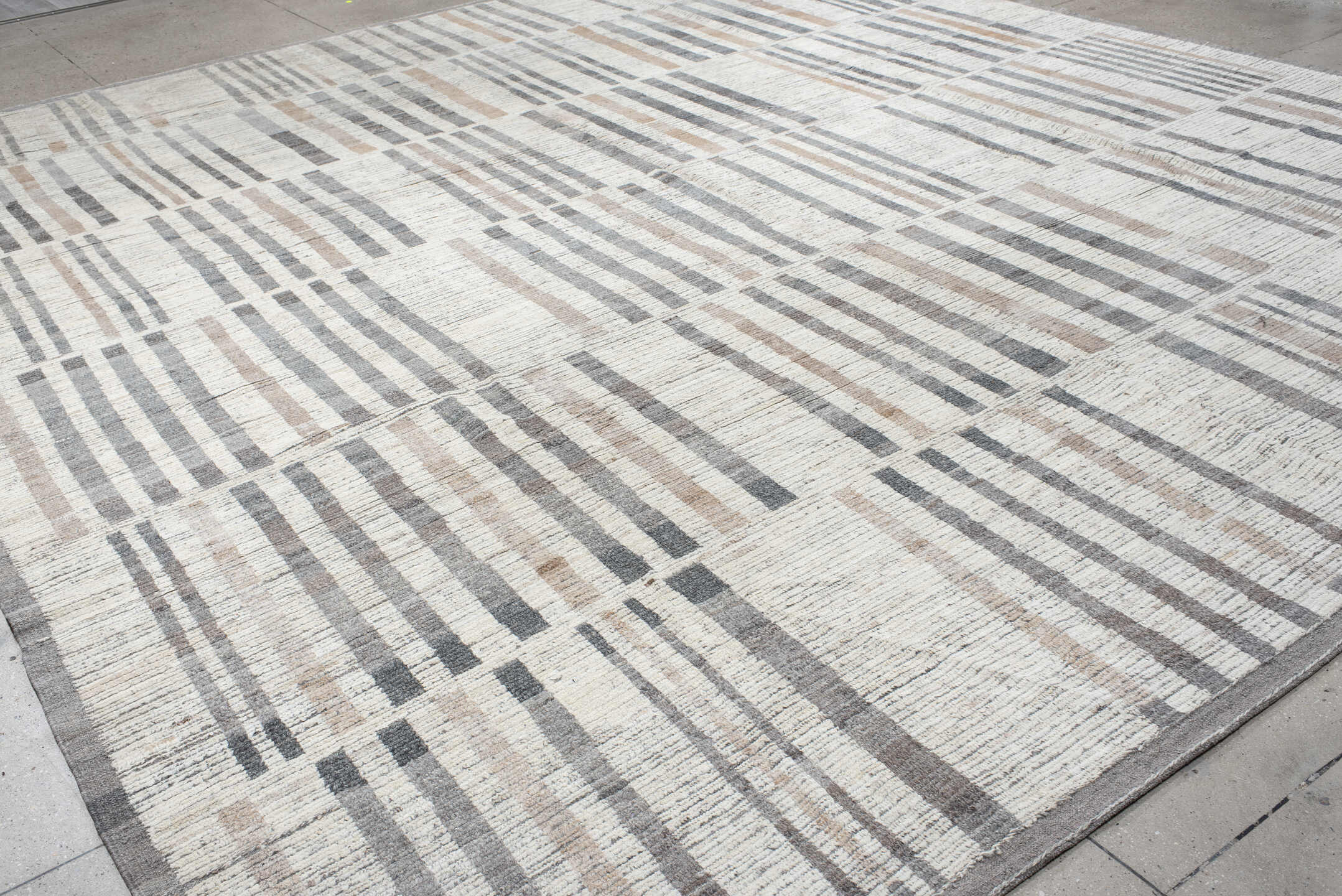 13' x 15' one-of-a-kind handmade vintage Tulu oversize rug. Color palette: ivory, gray, taupe, beige, charcoal, black