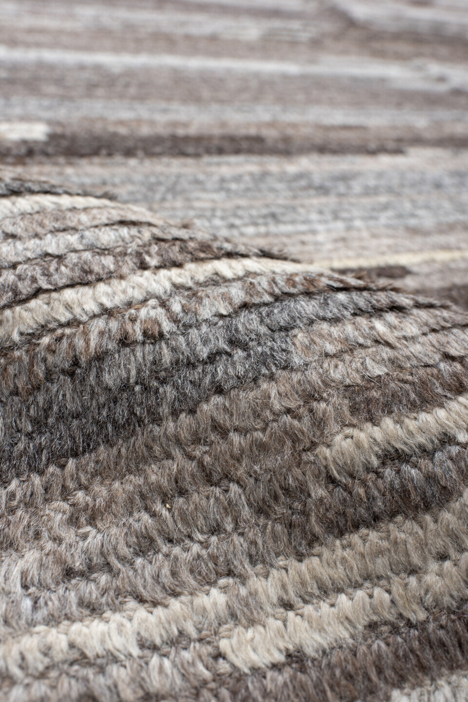 12' x 15' one-of-a-kind handmade vintage Tulu oversize rug. Color palette: black, brown, dark gray, gray, light gray, linen