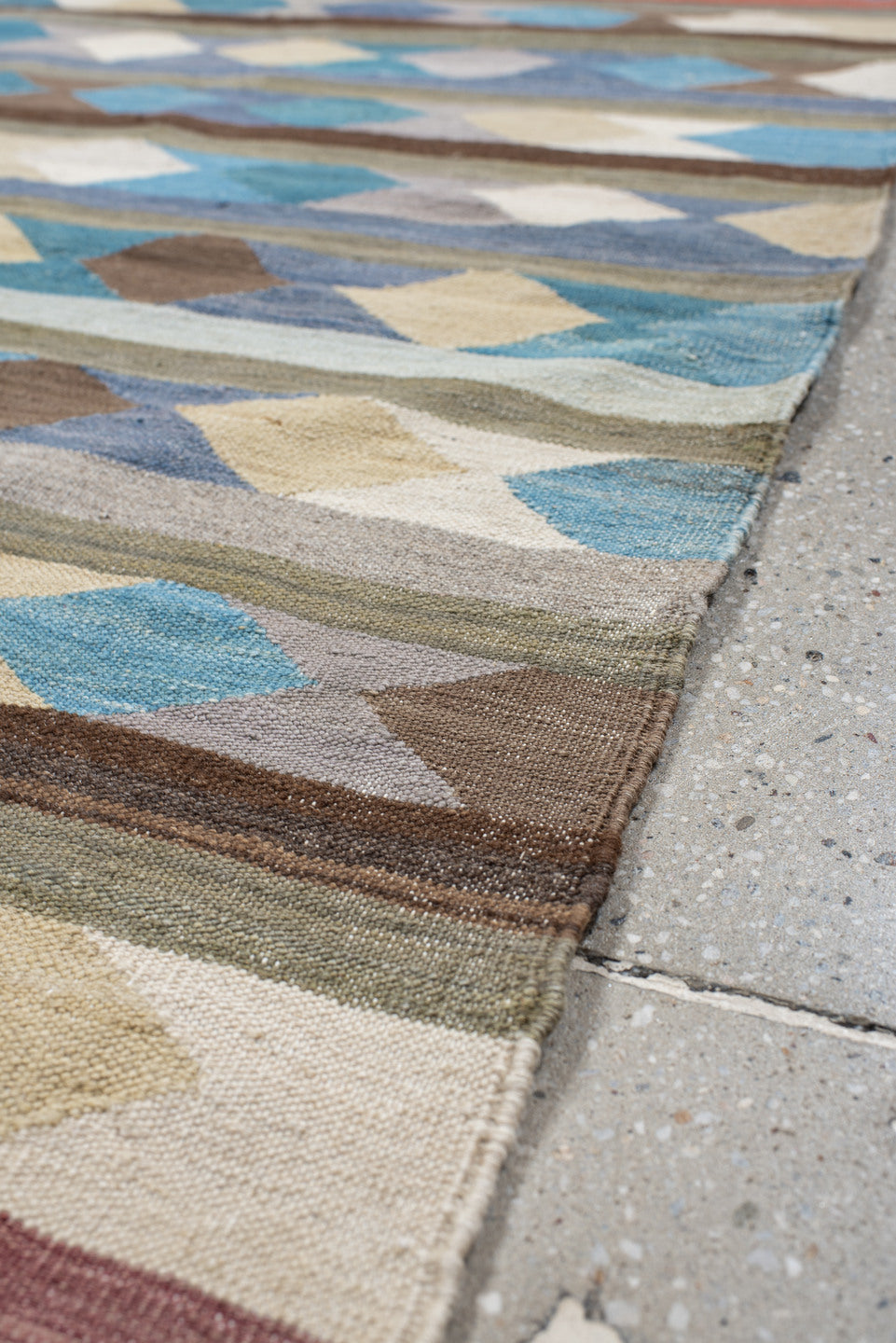 2' x 9' one-of-a-kind handmade vintage Kilim runner rug. Color palette: gray, brown, red, light blue, light gray, pink