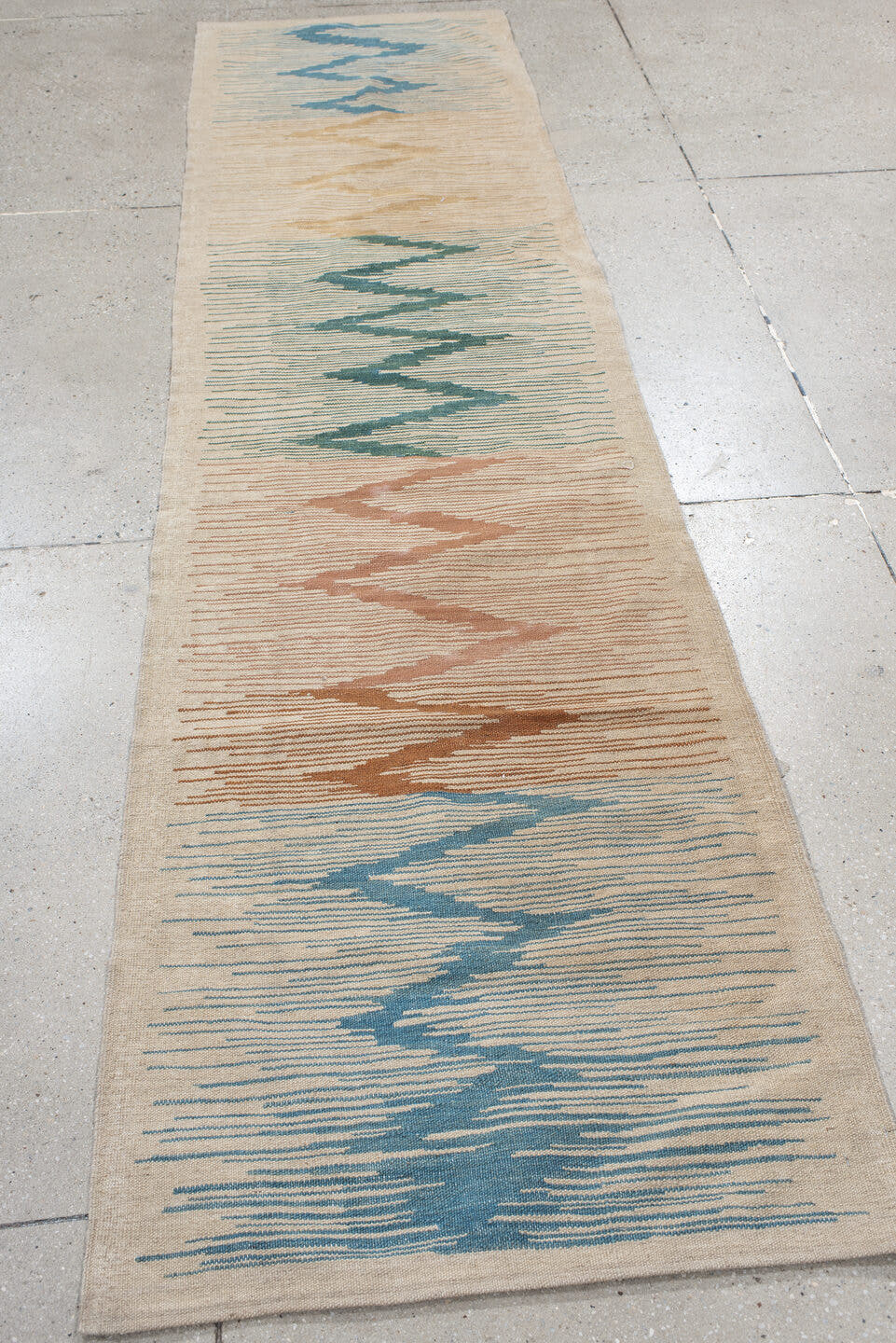 2' x 9' one-of-a-kind handmade vintage Kilim runner rug. Color palette: ivory, sky blue, teal, blush, terra cotta, sand