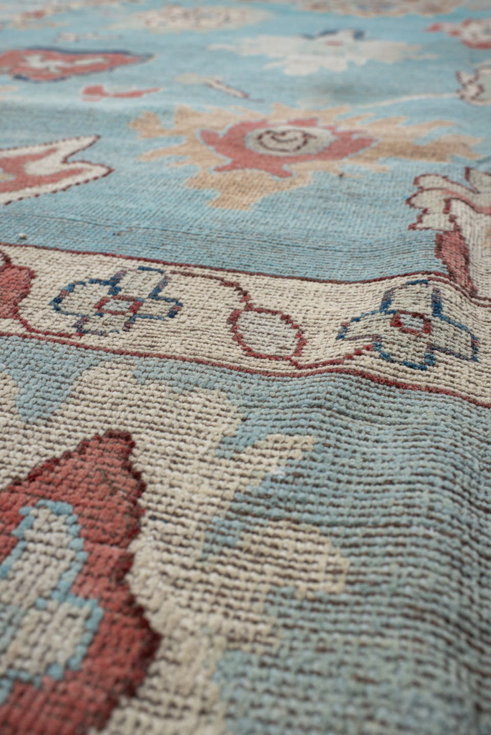 7' x 9' one-of-a-kind handmade vintage Oushak rug. Color palette: sky blue, ivory, pale blue, terra cotta, navy, beige