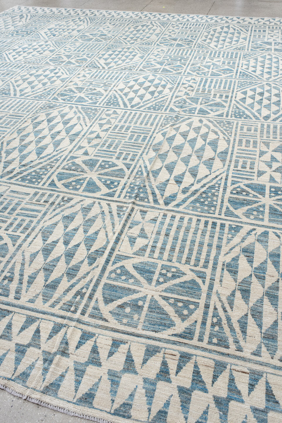 13' x 17' one-of-a-kind handmade vintage Tulu oversize rug. Color palette: ivory, sky blue, pale blue, light blue