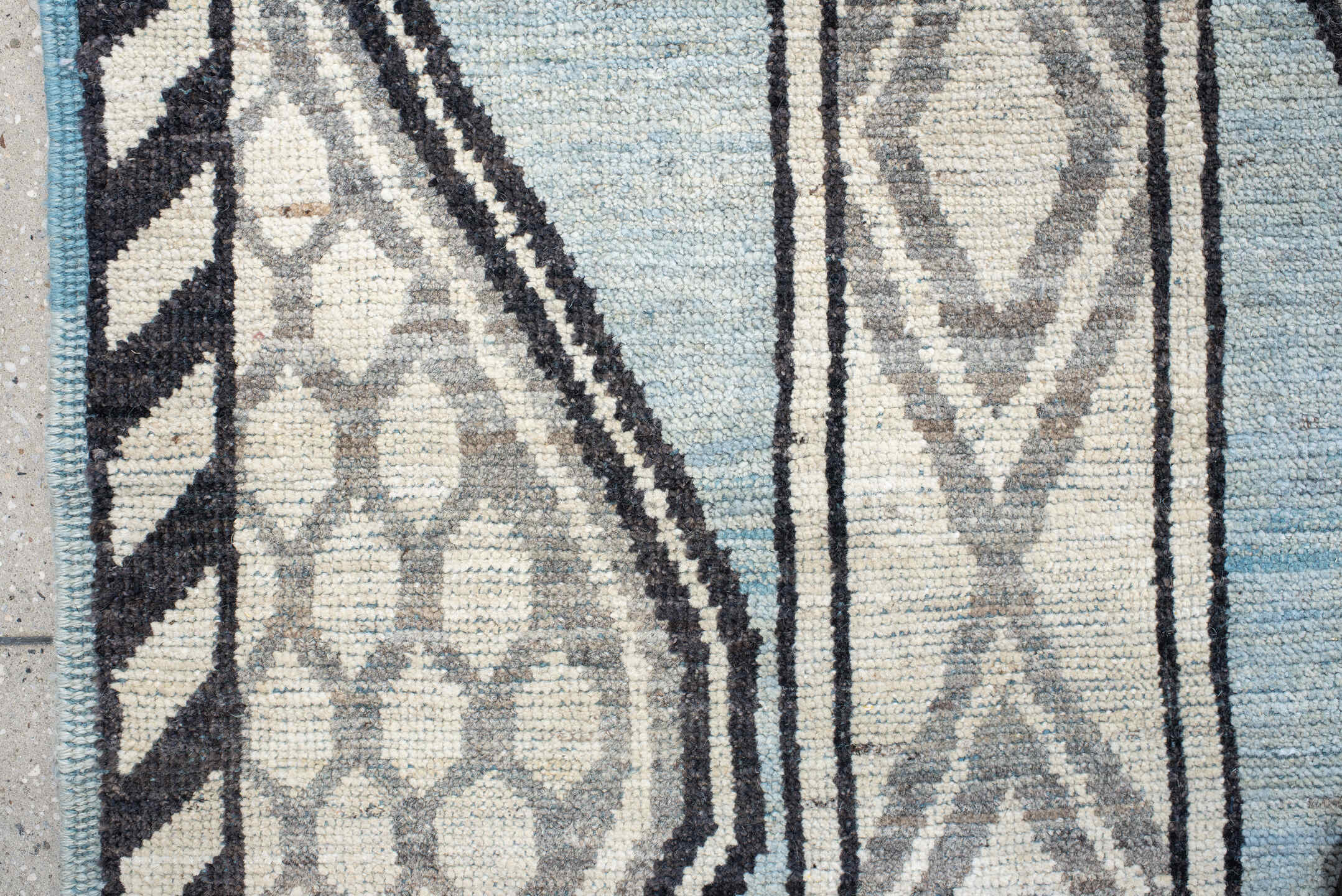14' x 19' one-of-a-kind handmade vintage Tulu oversize rug. Color palette: pale blue, ivory, charcoal, gray, light blue