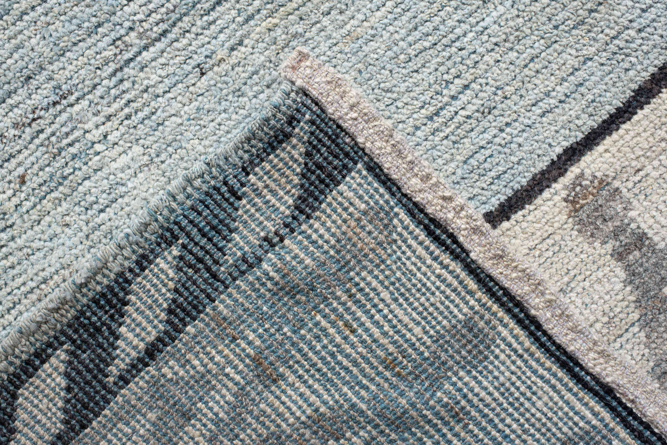 14' x 19' one-of-a-kind handmade vintage Tulu oversize rug. Color palette: pale blue, ivory, charcoal, gray, light blue