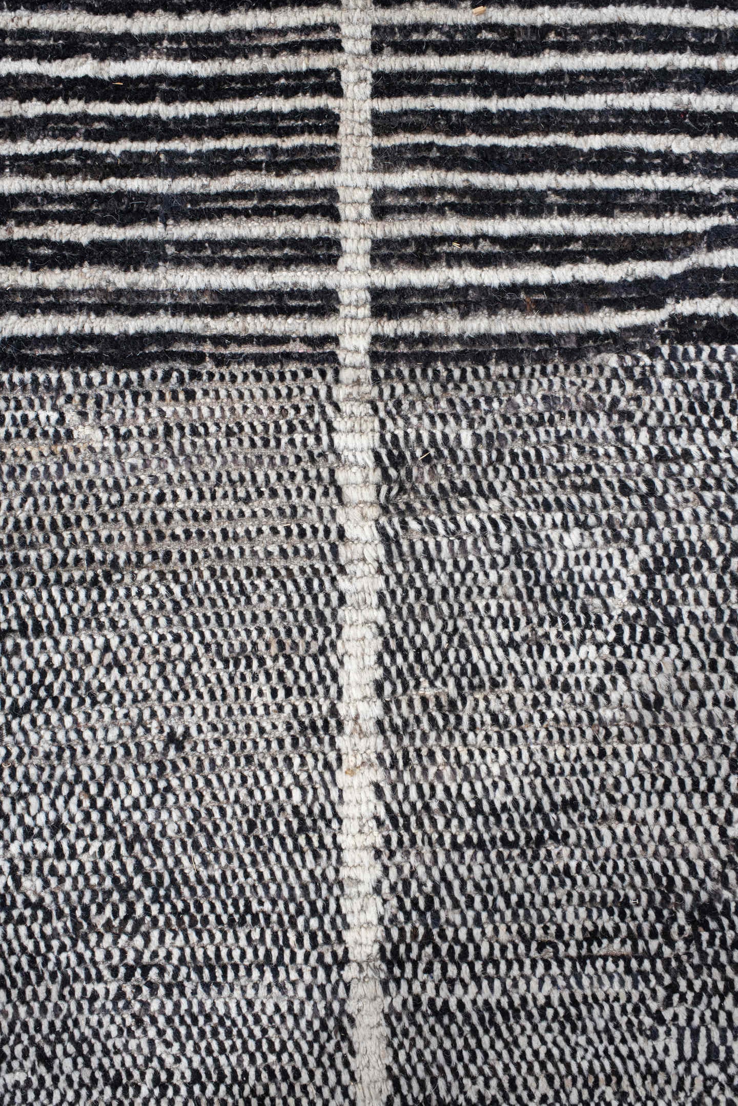 14' x 22' one-of-a-kind handmade vintage Tulu oversize rug. Color palette: charcoal, ivory, gray, black