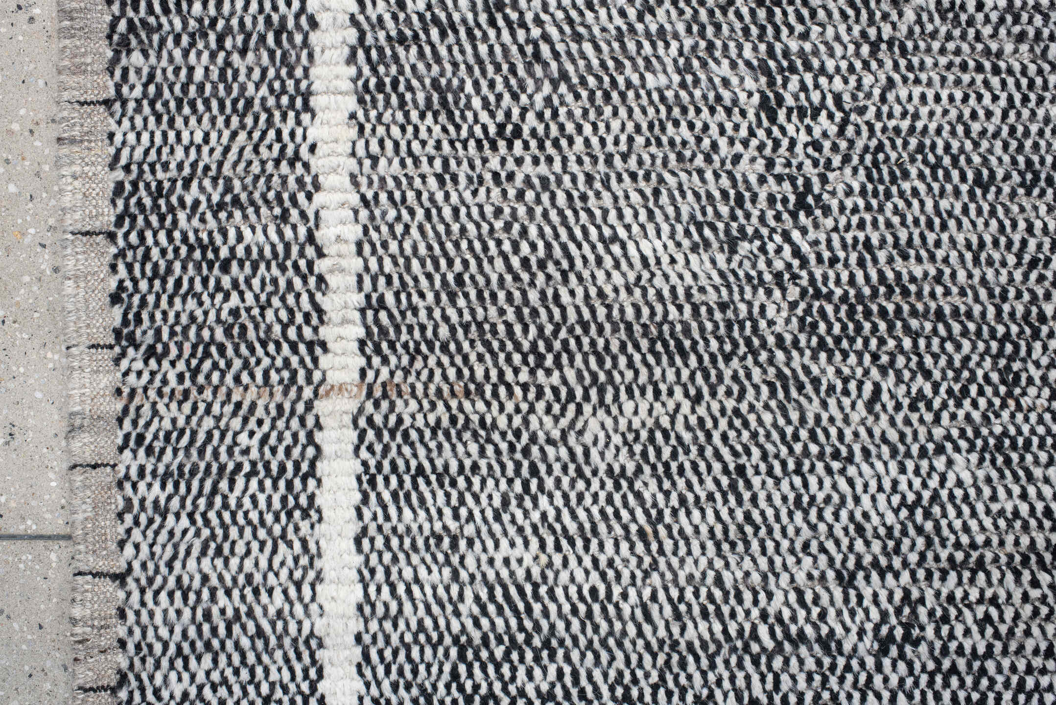 14' x 22' one-of-a-kind handmade vintage Tulu oversize rug. Color palette: charcoal, ivory, gray, black