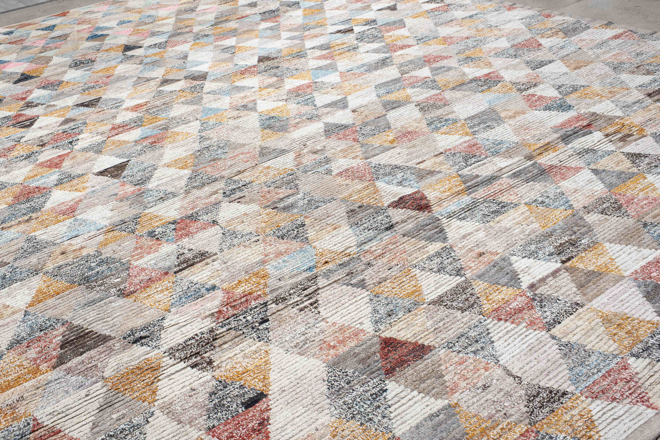 16' x 20' one-of-a-kind handmade vintage Tulu oversize rug. Color palette: ivory, gray, taupe, sky blue, gold, coral