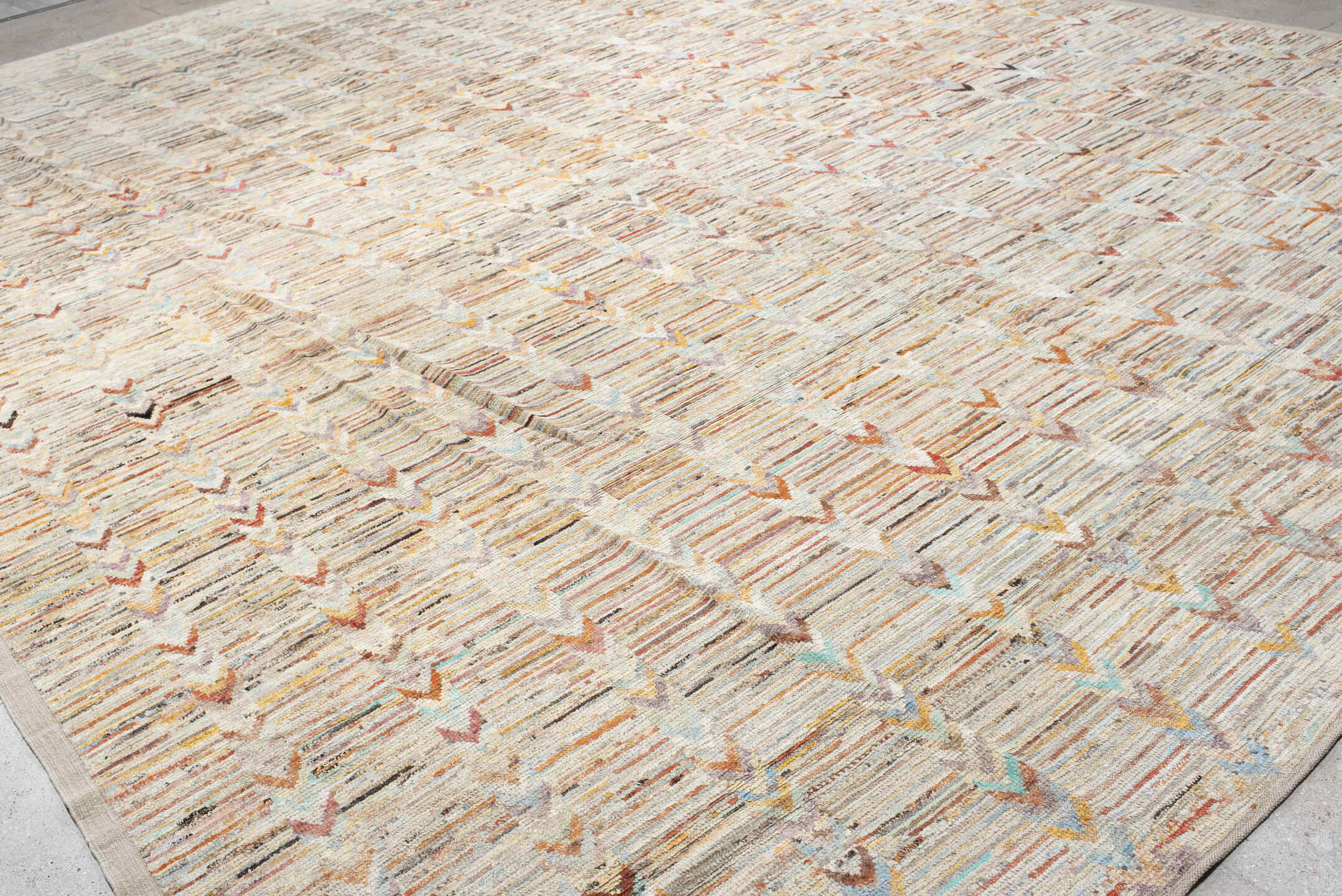 13' x 19' one-of-a-kind handmade vintage Tulu oversize rug. Color palette: ivory, cream, taupe, peach, sky_blue, charcoal