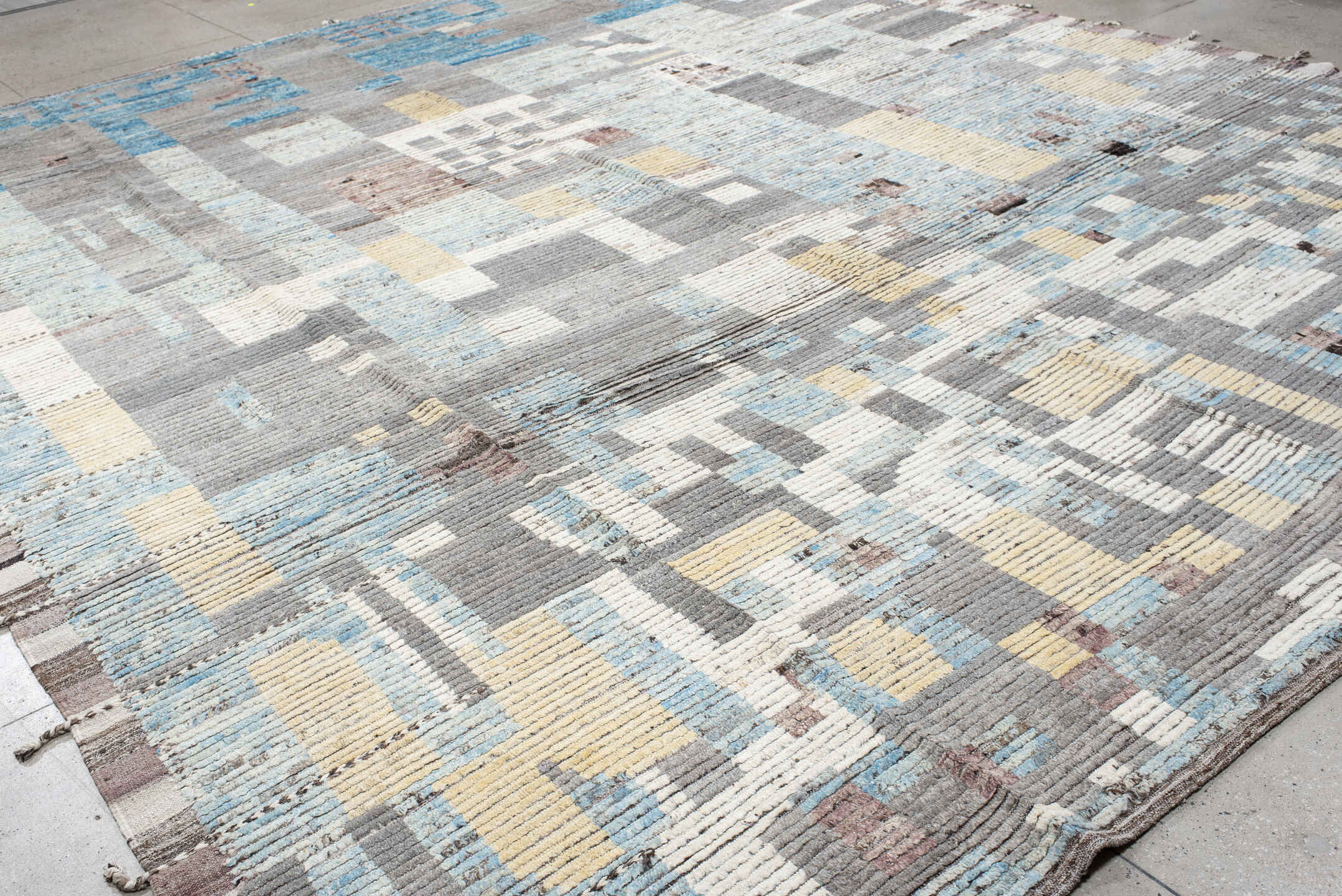 13' x 16' one-of-a-kind handmade vintage Tulu oversize rug. Color palette: gray, ivory, sky blue, cream, taupe, pale gold