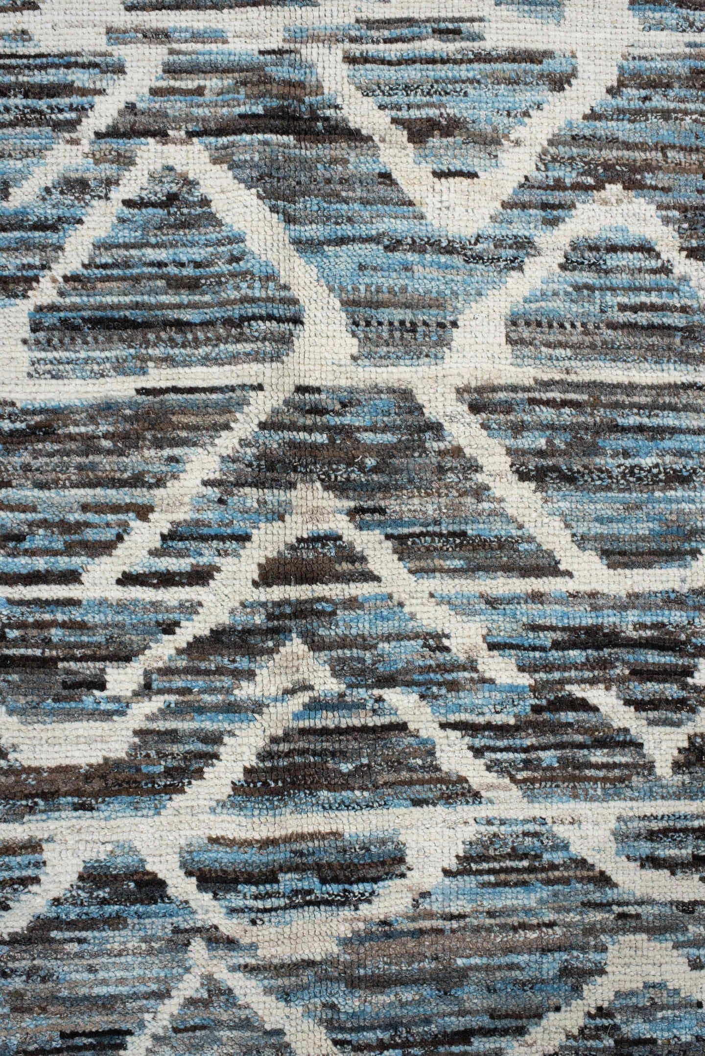 5' x 12' one-of-a-kind handmade vintage Tulu runner rug. Color palette: blue, charcoal, ivory, slate, gray, black