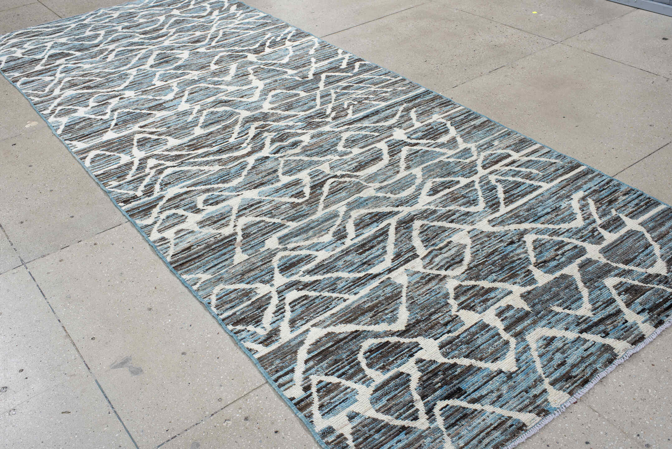 5' x 12' one-of-a-kind handmade vintage Tulu runner rug. Color palette: blue, charcoal, ivory, slate, gray, black