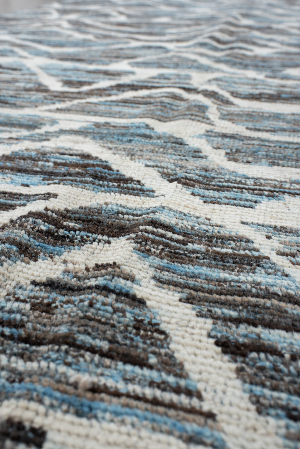 5' x 12' one-of-a-kind handmade vintage Tulu runner rug. Color palette: blue, charcoal, ivory, slate, gray, black