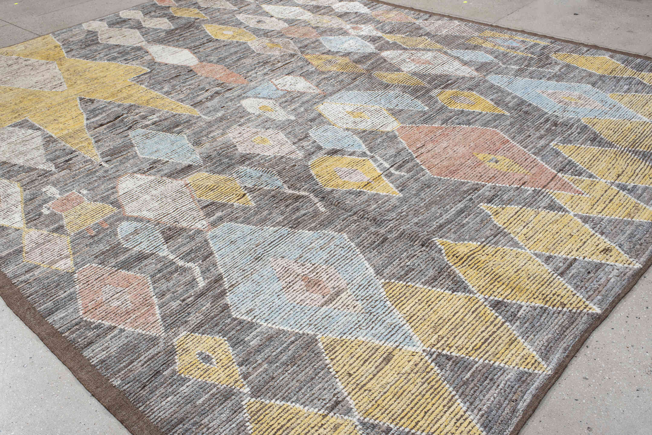10' x 13' one-of-a-kind handmade vintage Tulu large size rug. Color palette: brown, ivory, gold, sky_blue, coral, taupe