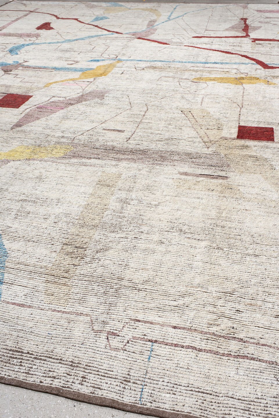 16' x 20' one-of-a-kind handmade vintage Tulu oversize rug. Color palette: ivory, rust, blush, sky blue, soft gold, taupe