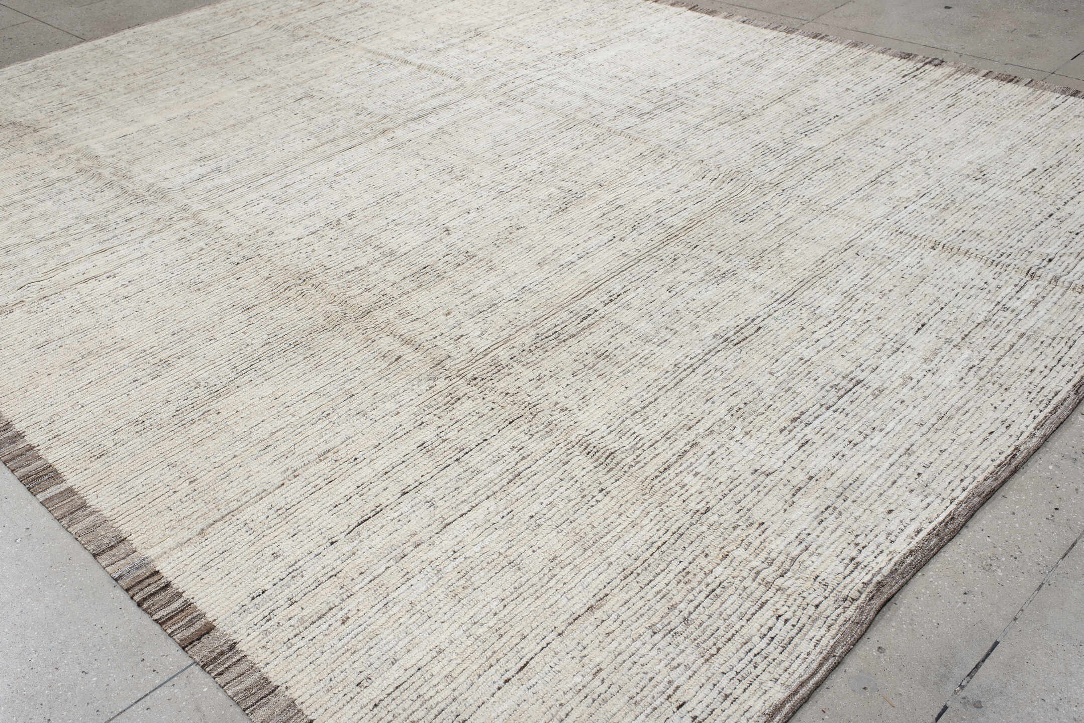 10' x 13' one-of-a-kind handmade vintage Tulu large size rug. Color palette: ivory, charcoal, taupe, brown, gray, black