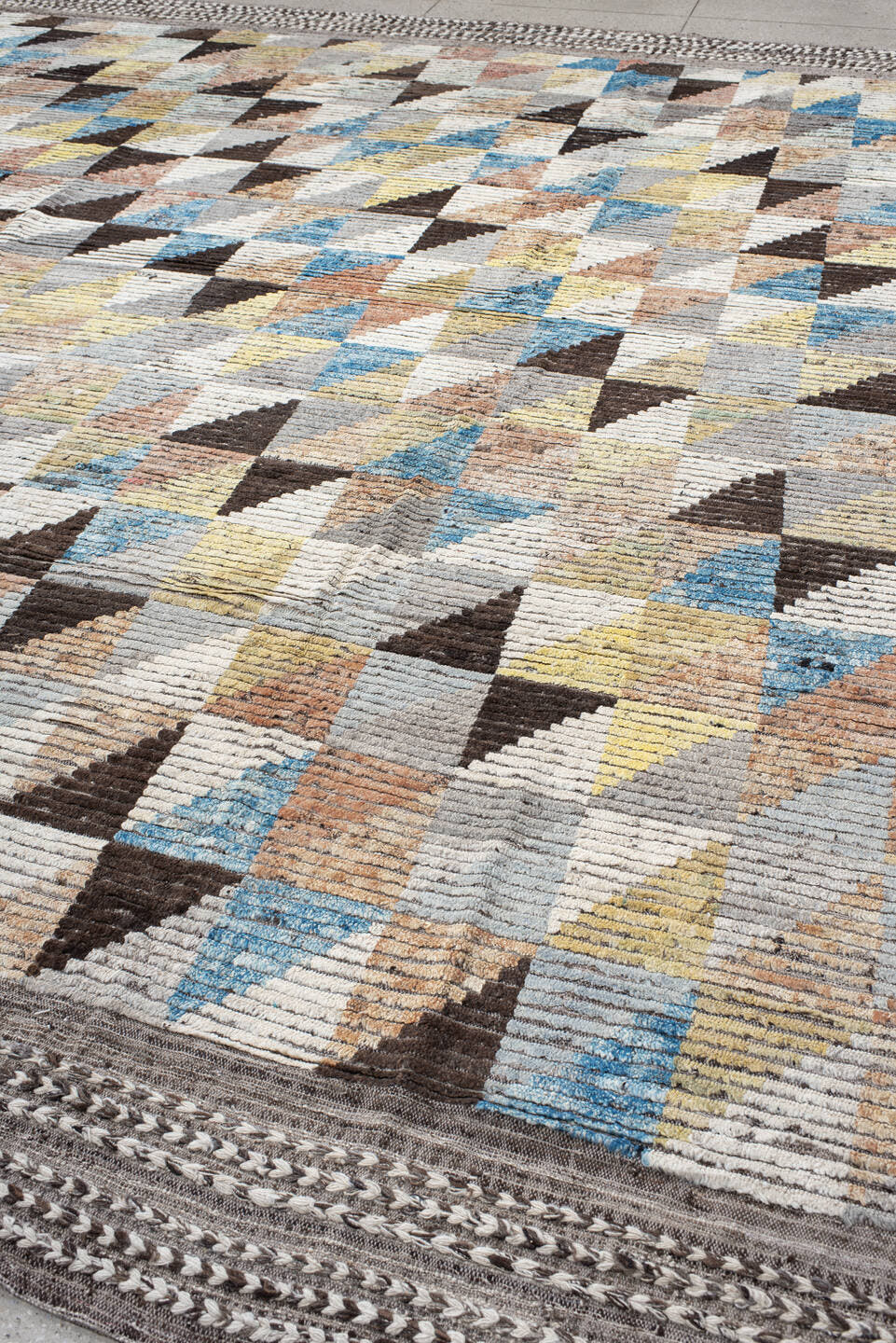 13' x 14' one-of-a-kind handmade vintage Tulu oversize rug. Color palette: ivory, gray, charcoal, sky blue, pale yellow
