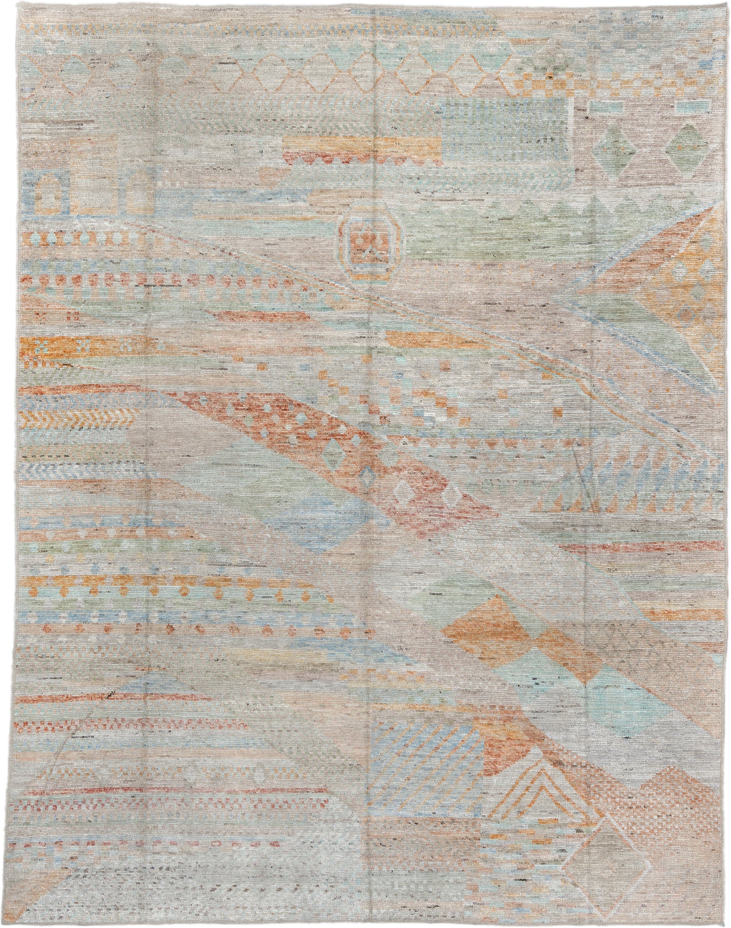 9' x 11' one-of-a-kind handmade vintage Tulu large size rug. Color palette: ivory, taupe, pale aqua, terracotta, sage, sand