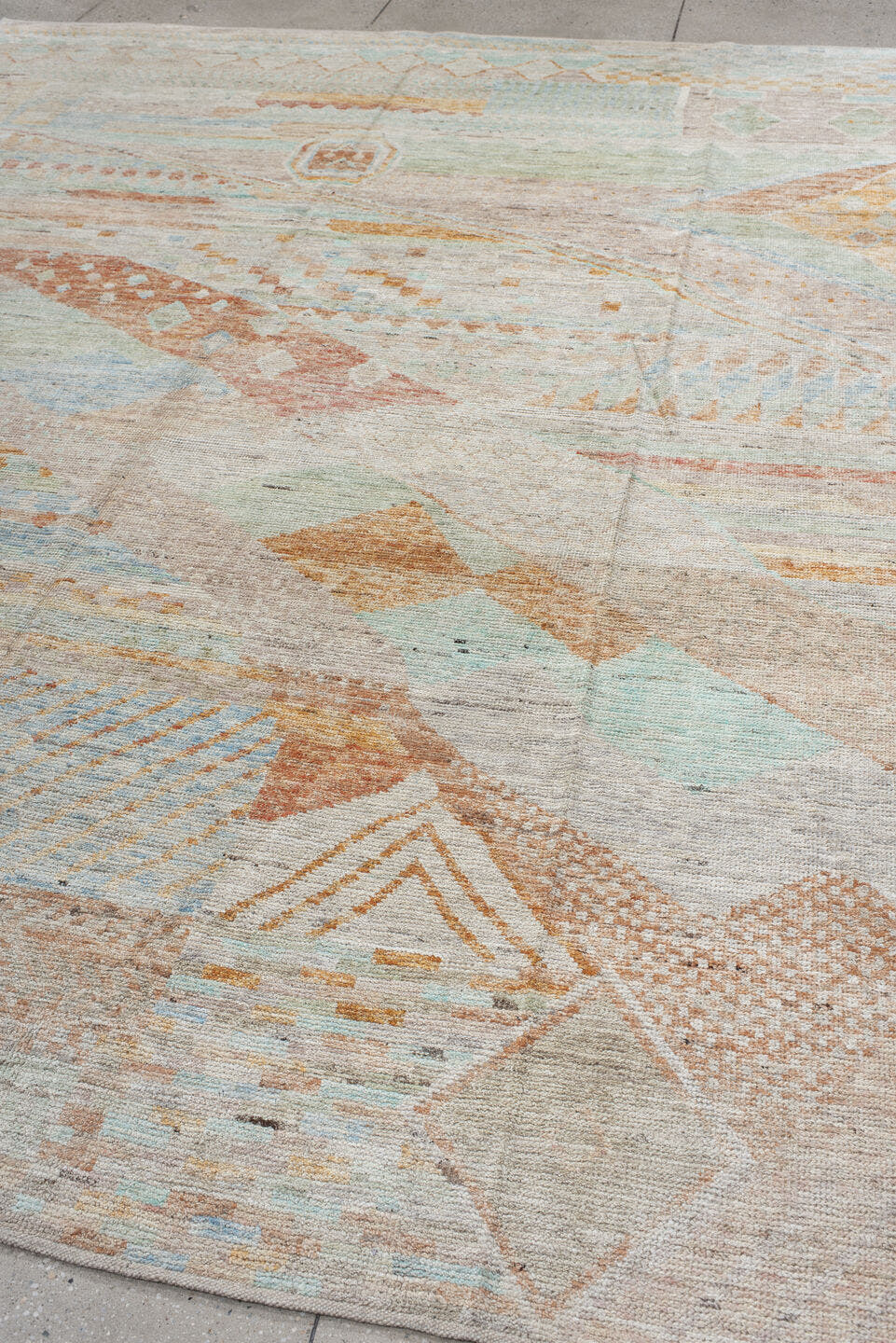 9' x 11' one-of-a-kind handmade vintage Tulu large size rug. Color palette: ivory, taupe, pale aqua, terracotta, sage, sand