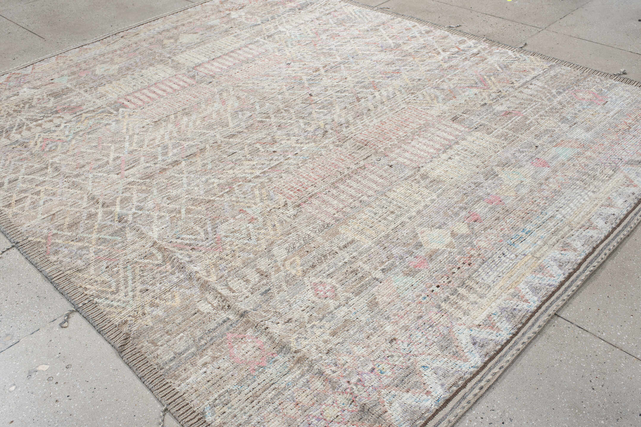 8' x 9' one-of-a-kind handmade vintage Tulu rug. Color palette: ivory, taupe, gray, blush, pale blue, charcoal, cream, coral