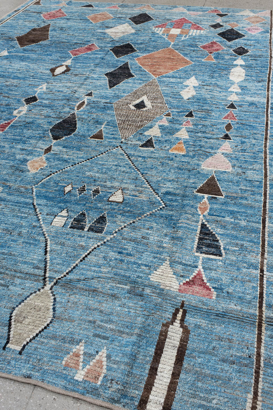 9' x 13' one-of-a-kind handmade vintage Tulu large size rug. Color palette: sky blue, ivory, charcoal, rose, taupe, brown