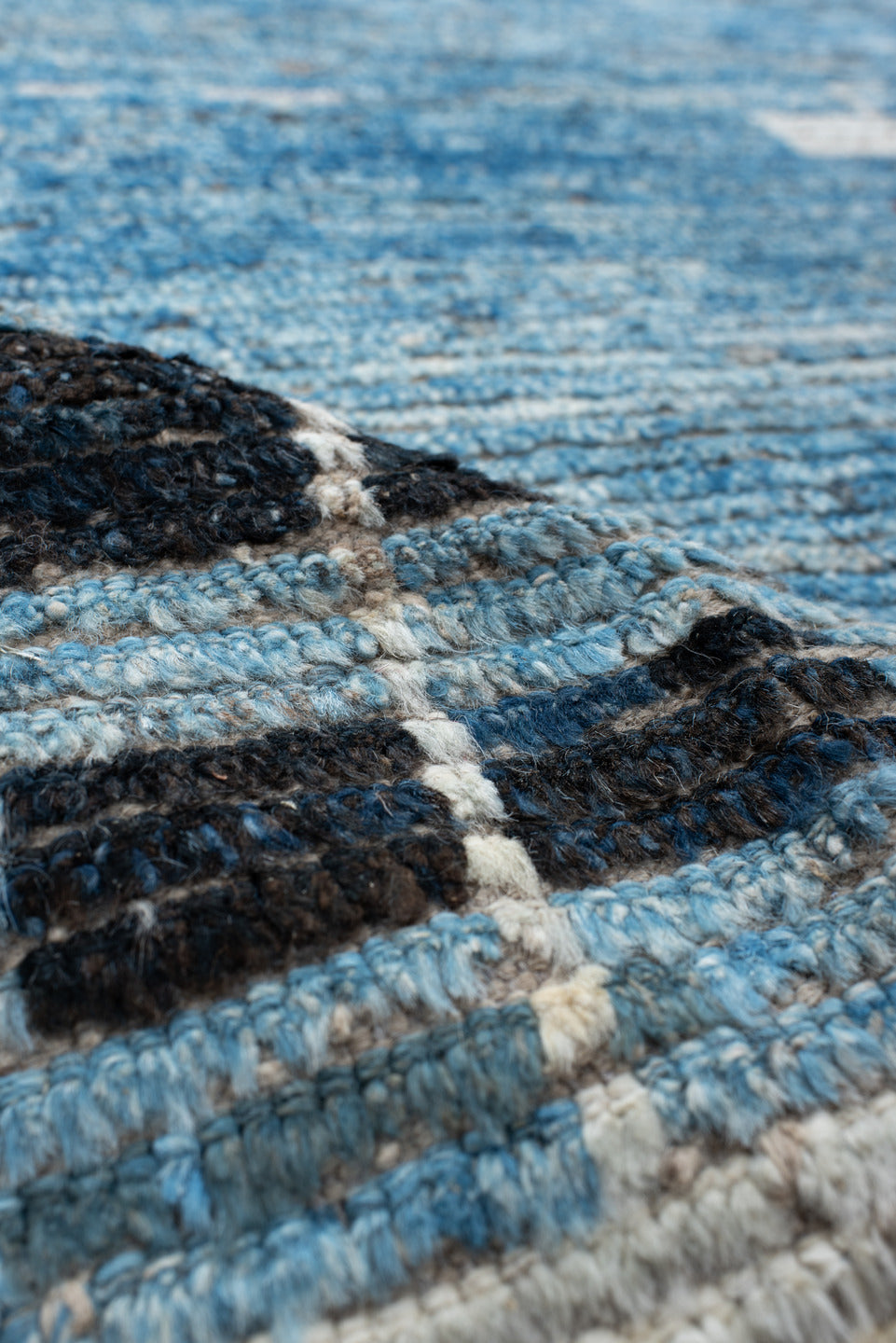 9' x 13' one-of-a-kind handmade vintage Tulu large size rug. Color palette: arapawa, black, blue, brown, gray, light blue