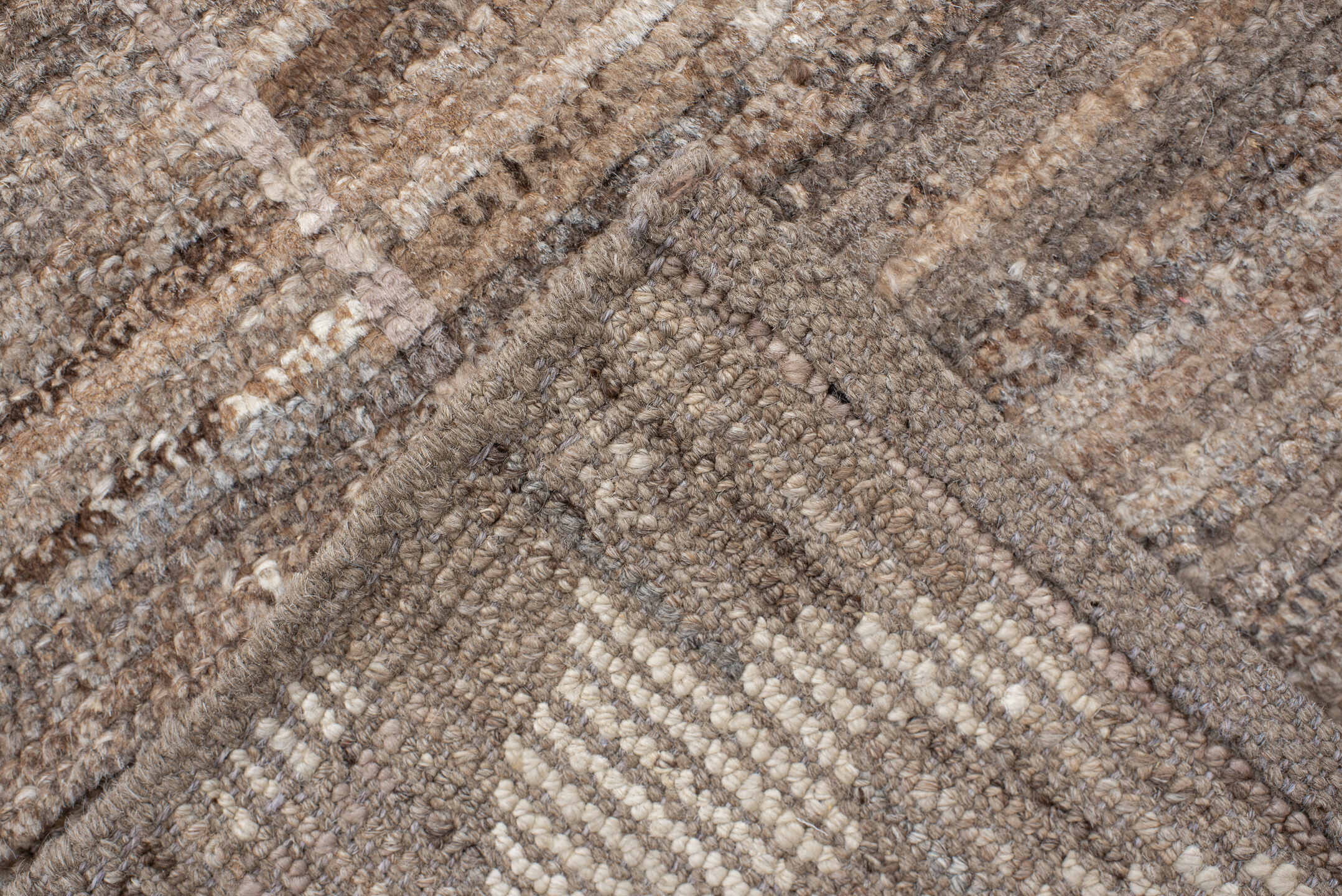 7' x 9' one-of-a-kind handmade vintage Tulu rug. Color palette: ivory, taupe, brown, charcoal, cream, rose, slate, pale blue