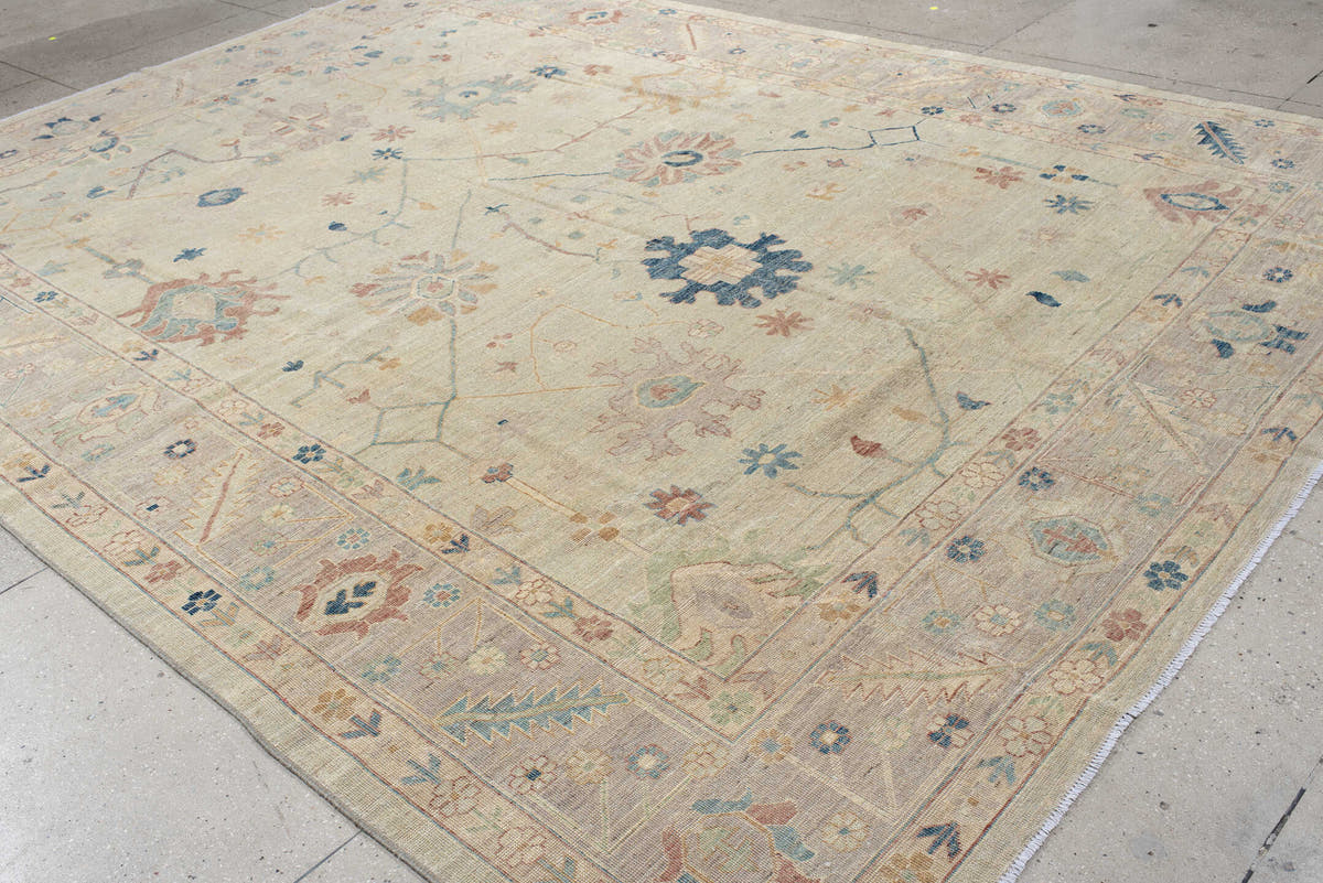10' x 13' one-of-a-kind handmade vintage Oushak large size rug. Color palette: ivory, beige, pale blue, blush, sage, sand