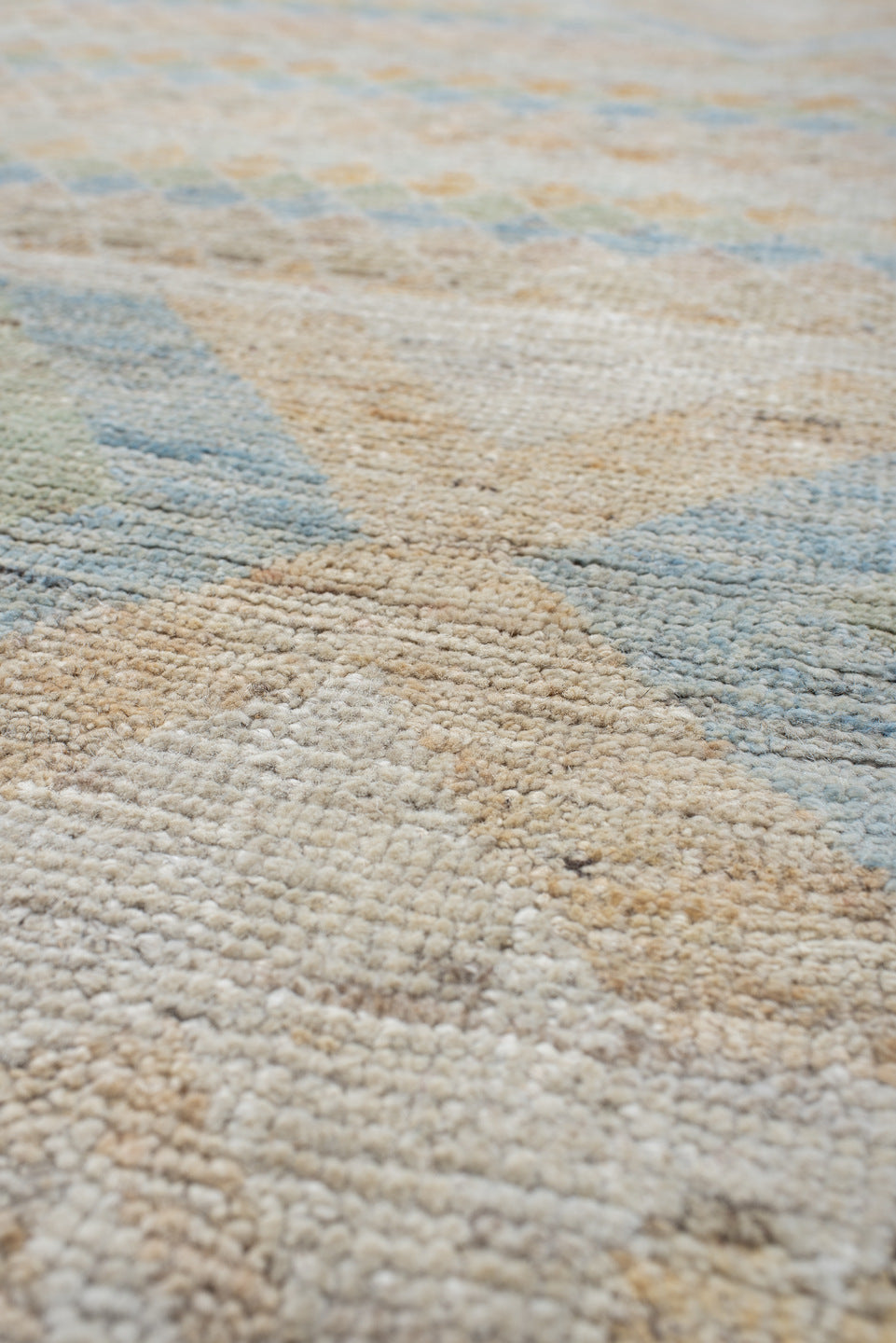 9' x 13' one-of-a-kind handmade vintage Tulu large size rug. Color palette: ivory, pale blue, sand, sage, peach, taupe