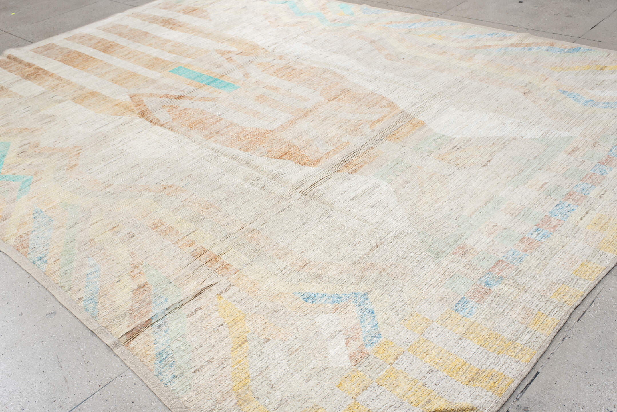 10' x 13' one-of-a-kind handmade vintage Tulu large size rug. Color palette: ivory, peach, aqua, sand, pale yellow, taupe