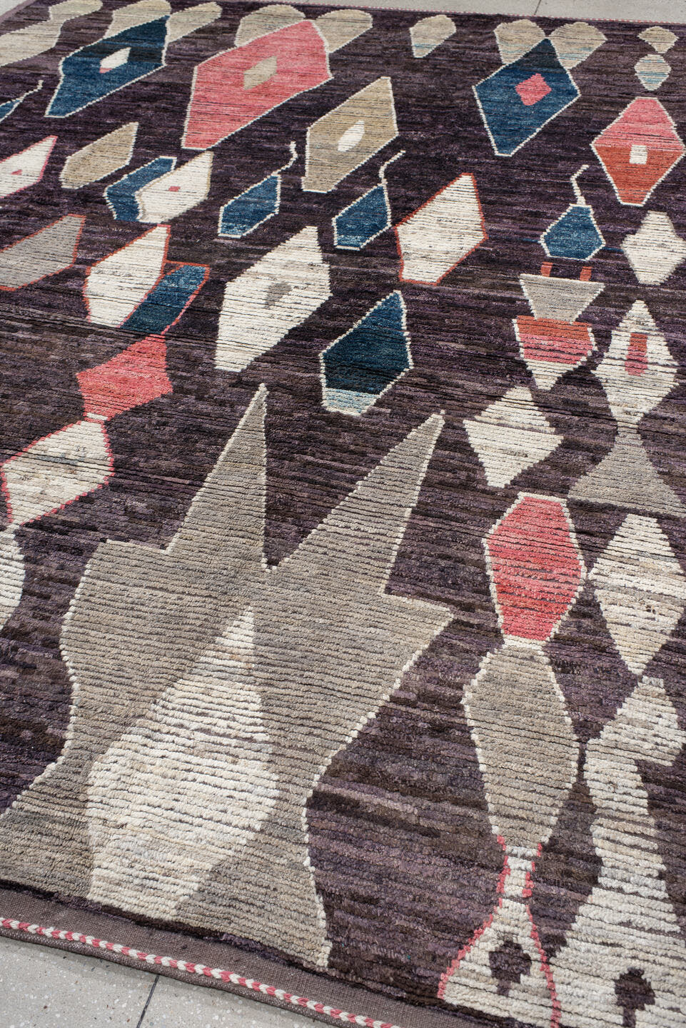 9' x 12' one-of-a-kind handmade vintage Tulu large size rug. Color palette: plum, ivory, taupe, indigo, coral, rose