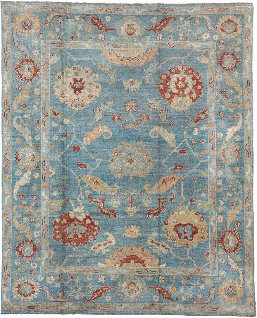 7' x 9' one-of-a-kind handmade vintage Oushak rug. Color palette: sky blue, ivory, rust, blush, beige, sage, light blue