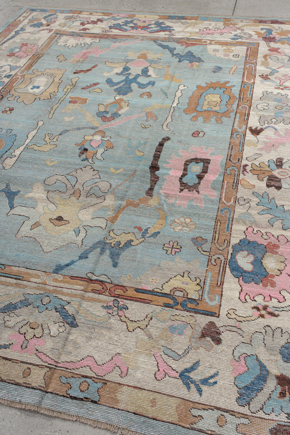 7' x 9' one-of-a-kind handmade vintage Oushak large size rug. Color palette: light blue, ivory, peach, pink, navy, taupe