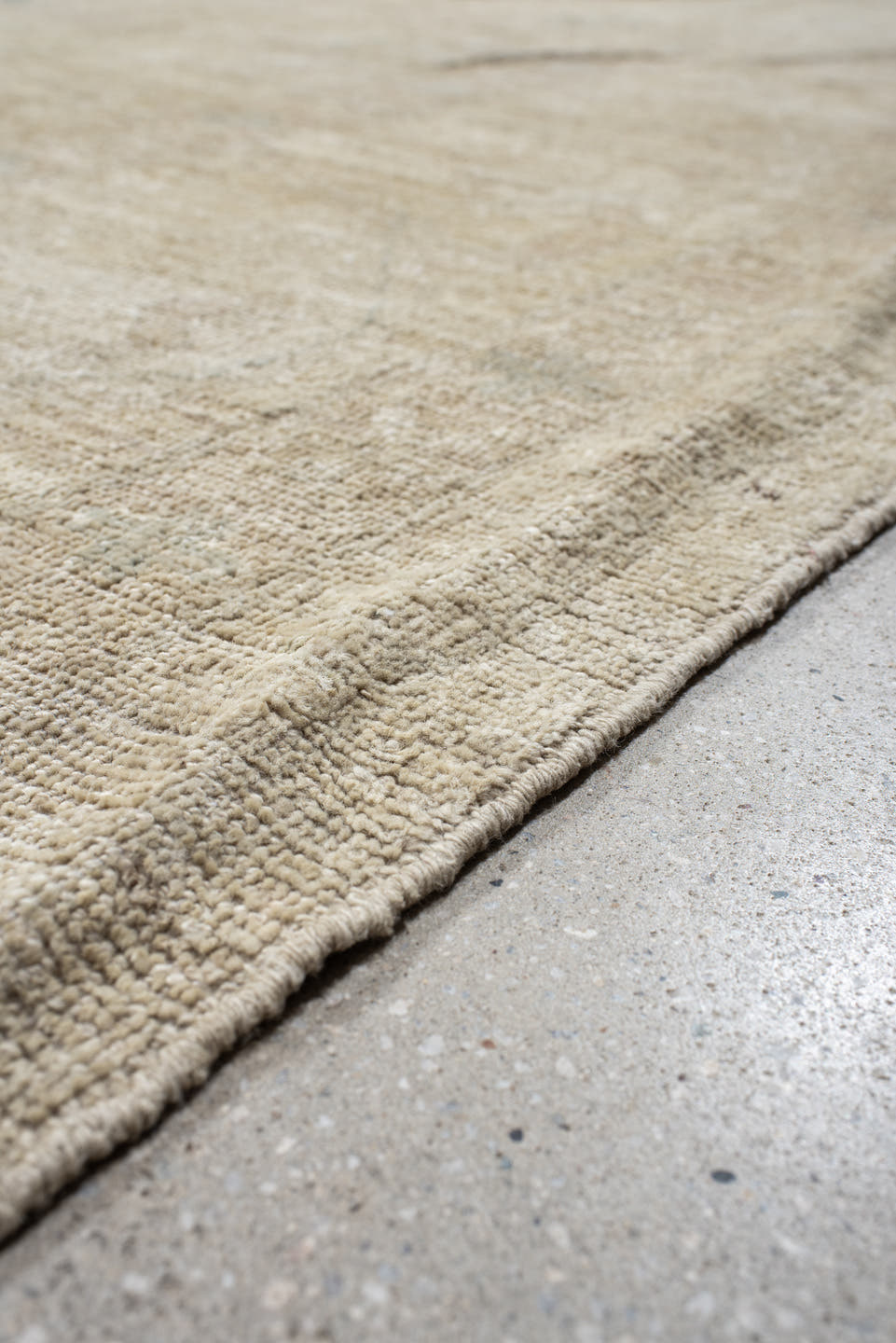 14' x 17' one-of-a-kind handmade vintage Tulu oversize rug. Color palette: ivory, beige, taupe, pale blue, cream, sand, gray