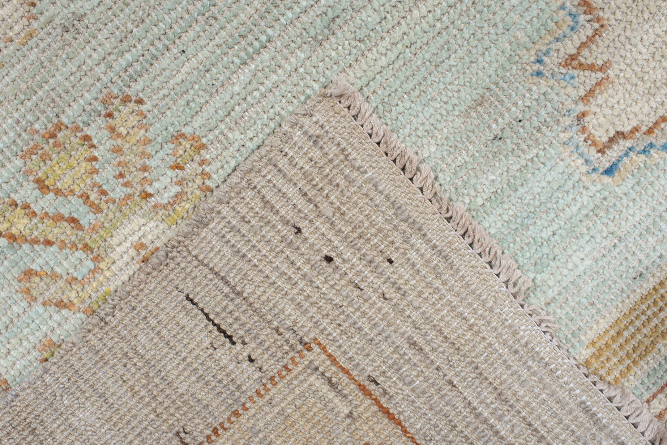 9' x 13' one-of-a-kind handmade vintage Oushak large size rug. Color palette: ivory, pale aqua, beige, sand, muted gold