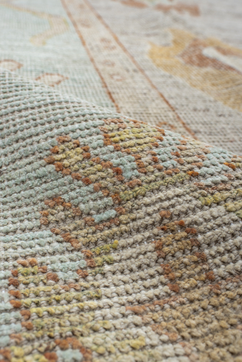 9' x 13' one-of-a-kind handmade vintage Oushak large size rug. Color palette: ivory, pale aqua, beige, sand, muted gold