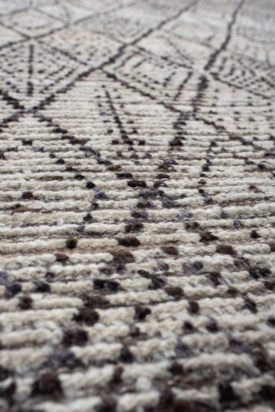 10' x 13' one-of-a-kind handmade vintage Tulu large size rug. Color palette: ivory, charcoal, taupe, brown, gray, black