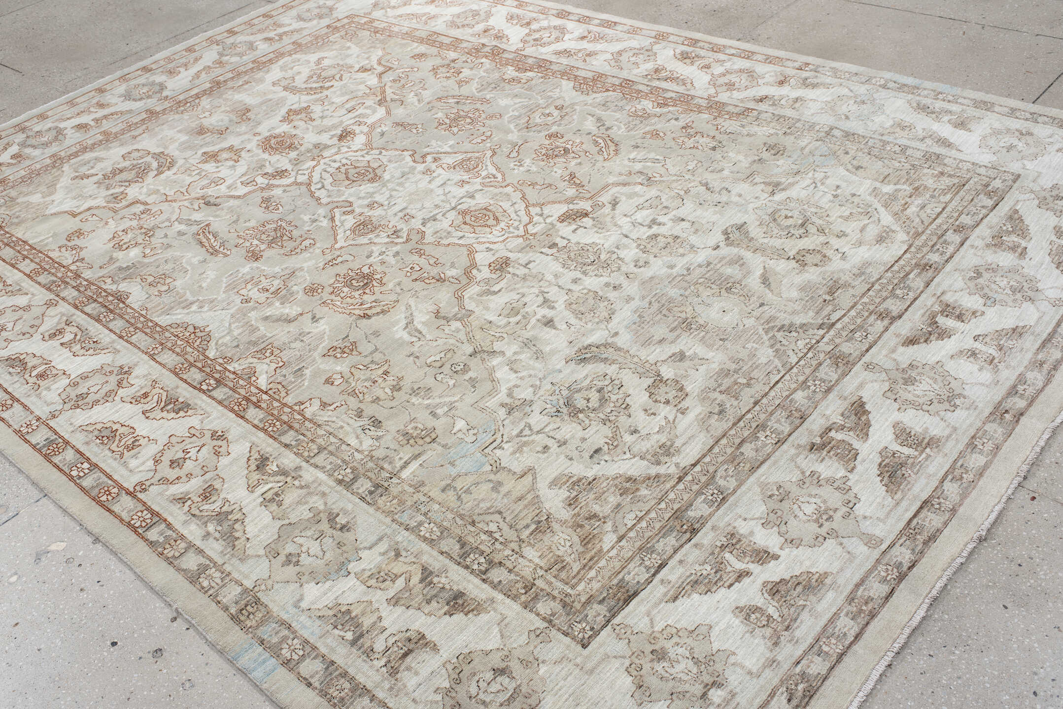 8' x 10' one-of-a-kind handmade vintage Oushak large size rug. Color palette: ivory, taupe, beige, pale blue, rust, camel