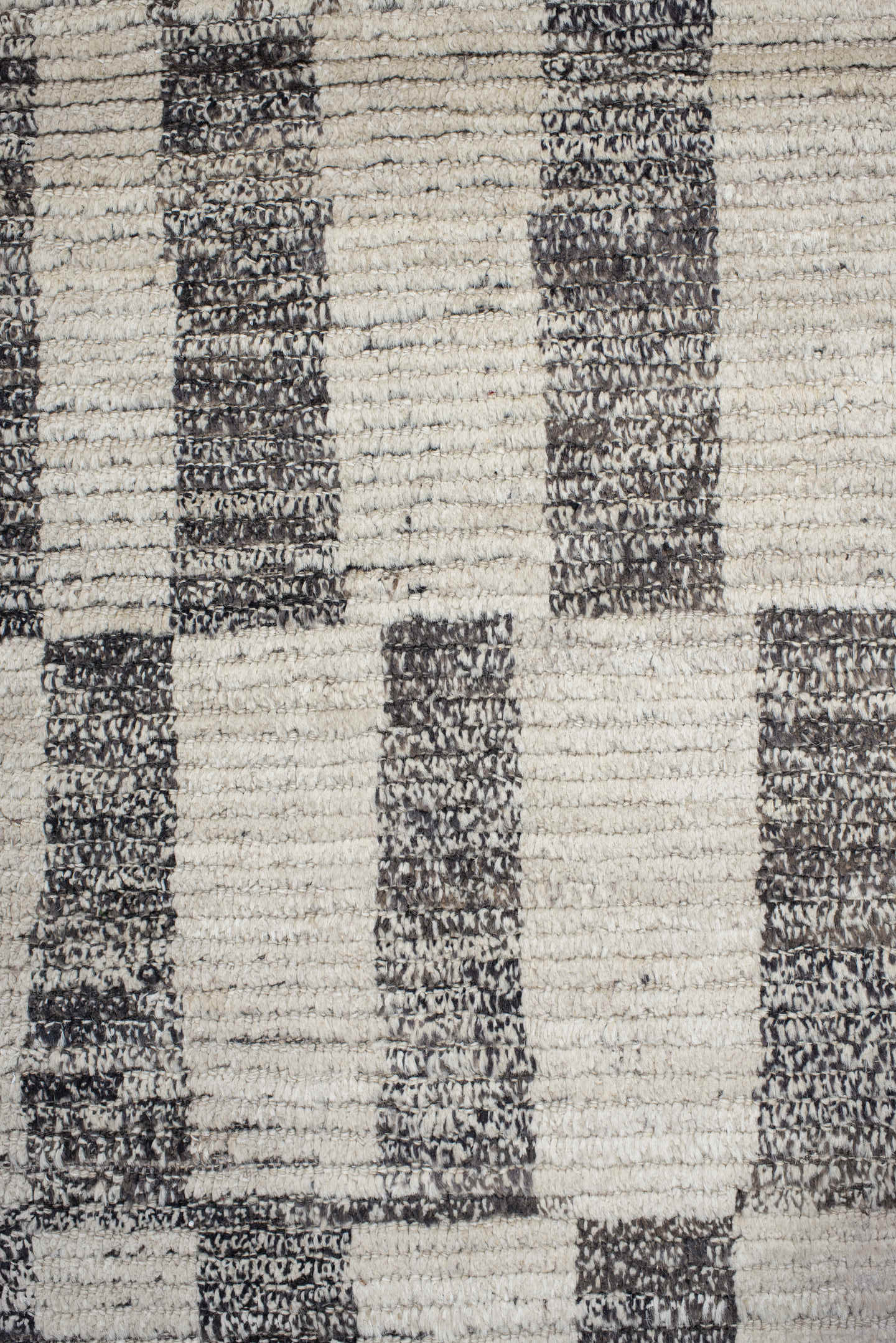 8' x 9' one-of-a-kind handmade vintage Tulu rug. Color palette: ivory, charcoal, gray, black