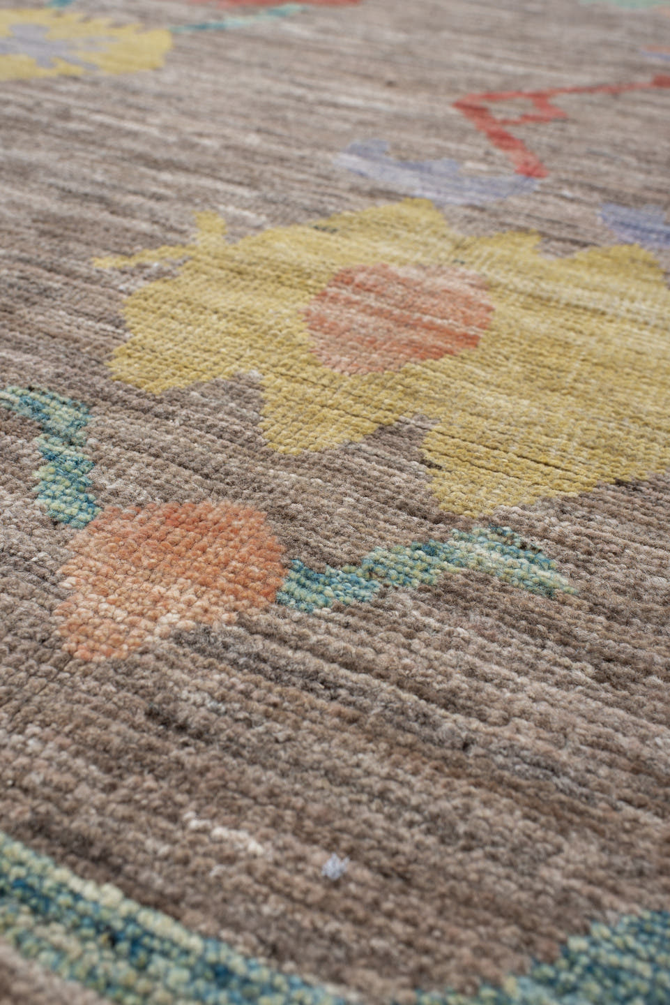 8' x 9' one-of-a-kind handmade vintage Oushak rug. Color palette: taupe, aqua, rust, pale yellow, peach, lavender, ivory