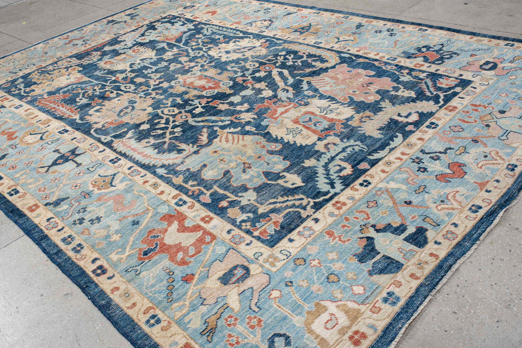 9' x 13' one-of-a-kind handmade vintage Oushak large size rug. Color palette: sky blue, navy, ivory, rust, cream, slate